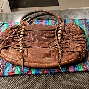 Chic Brown Distressed Leather Shoulder Bag with Gold Details